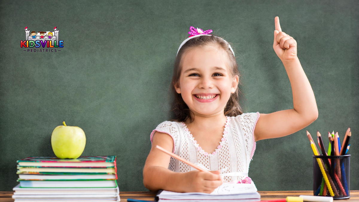 A young girl happily studying.