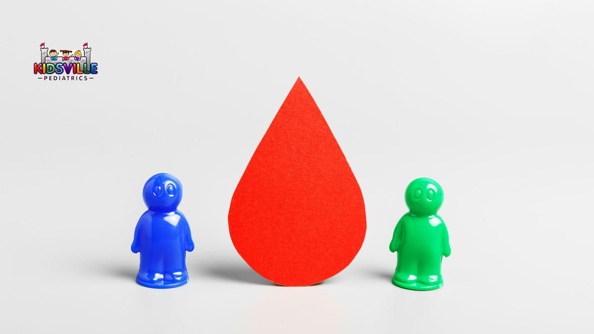 Drop of blood and plastic figures of people on a gray background. World Blood Donor Day. World Hemophilia Day. World Diabetes Day. Blood donation concept.