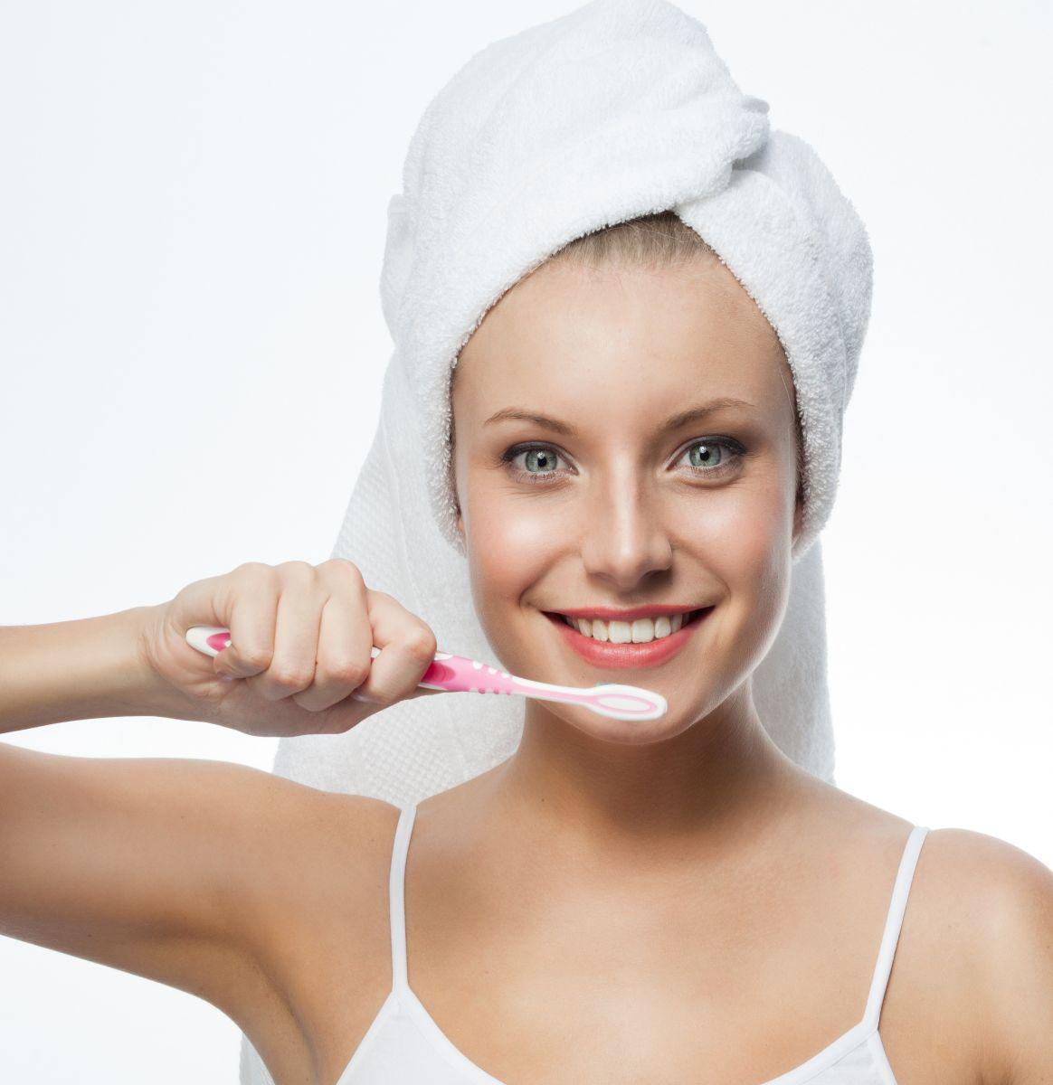 Woman brushing her teeth