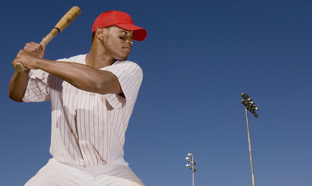 baseball player getting ready to hit a ball