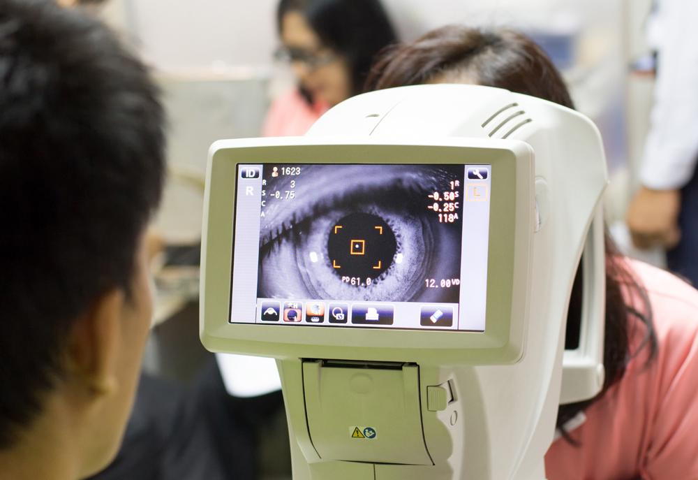 Optometrist examining Eye Health