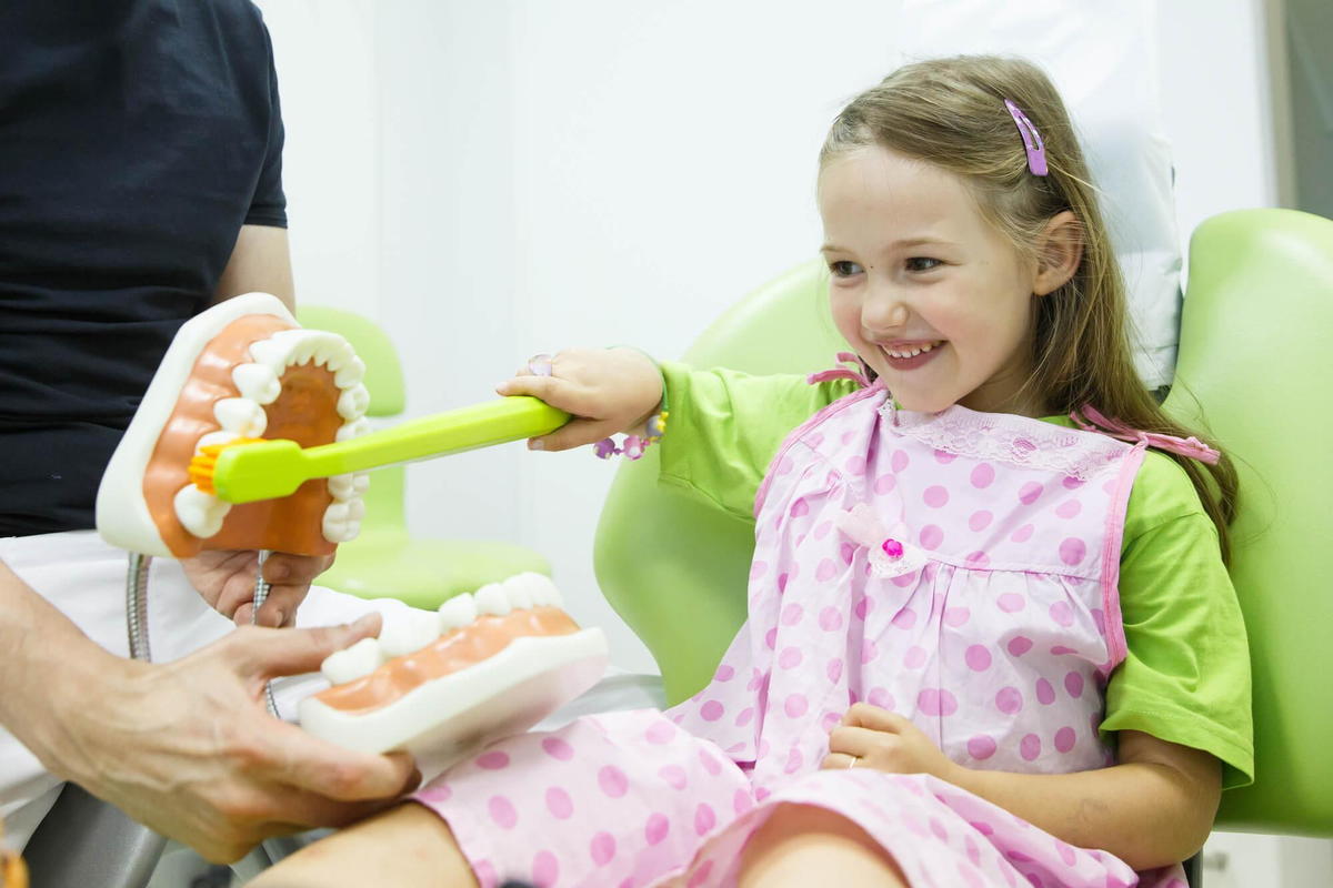 girl during appointment for Pediatric dentistry in Suffolk