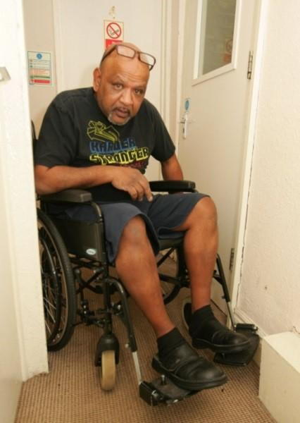 Rafee Baksh says the hostel is 'inaccessible' for him in a wheelchair.