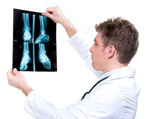 podiatrist looking at an x-ray