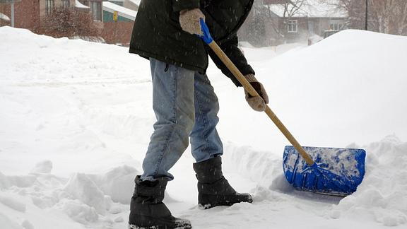 Image of person shoveling snow