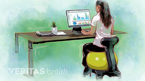 Illustration of a woman using an exercise ball with a base at a desk